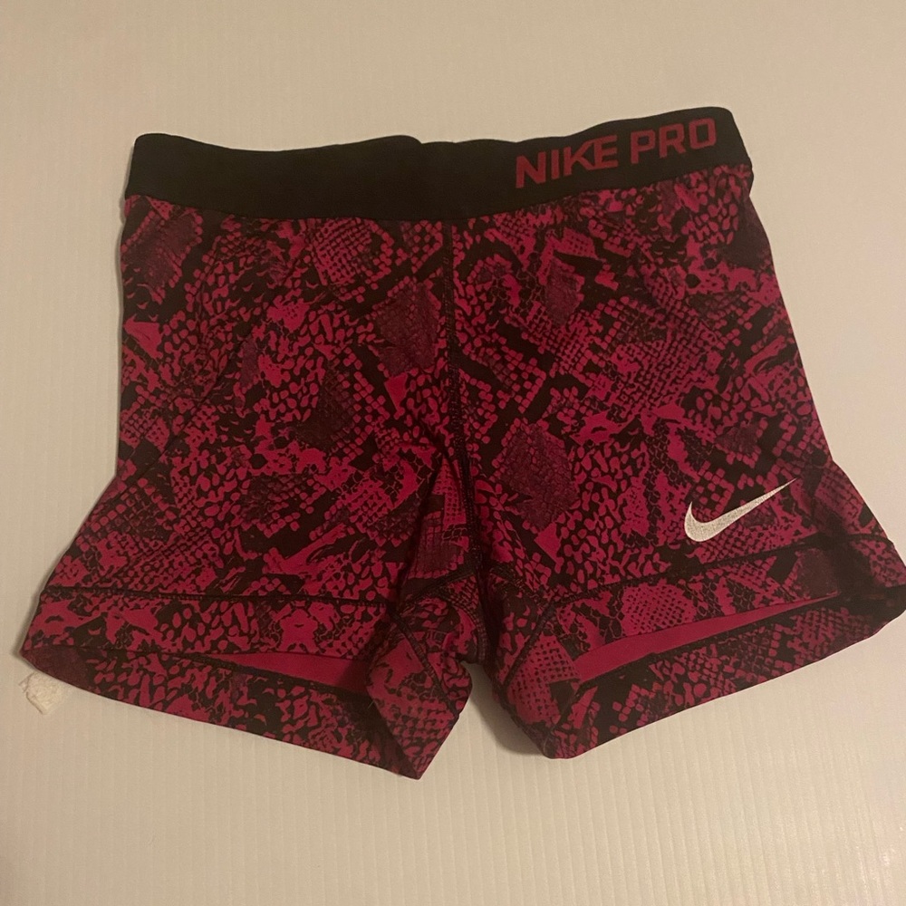 Pink and black Nike pro spandex running shorts